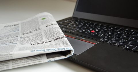 Newspaper on a laptop