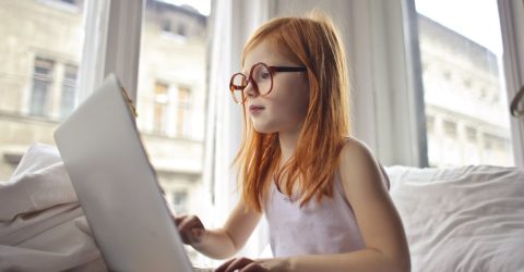 a child using a laptop